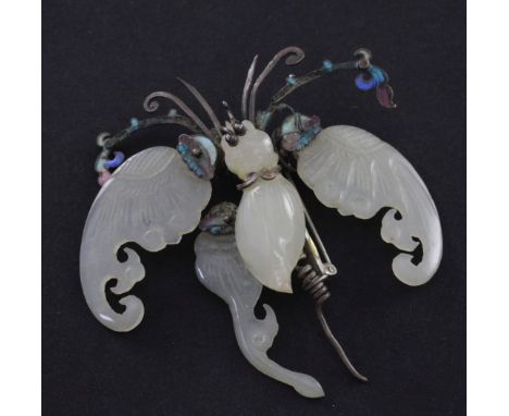 A Chinese pale celadon jade silver and enamelled articulated model of a butterfly, late 19th / early 20th century, width 7.5c