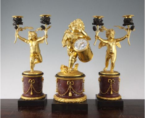 A French ormolu and rouge marble clock garniture, candelabra 13.25in. A French ormolu and rouge marble clock garniture, the c