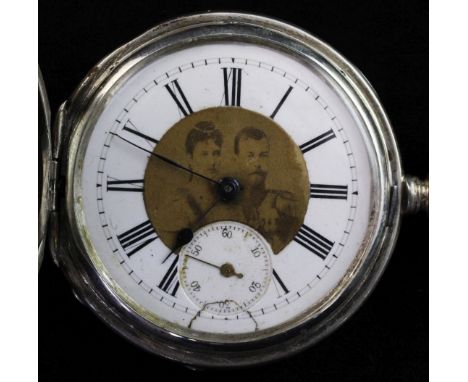 An early 20th century Russian engine turned 84 zolotnik silver military related hunter keywind pocket watch, An early 20th ce