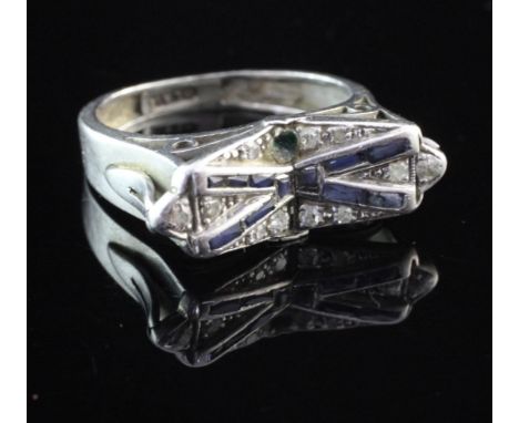 A stylish 1920's/1930's platinum, synthetic sapphire and diamond dress ring, size R. A stylish 1920's/1930's platinum, synthe