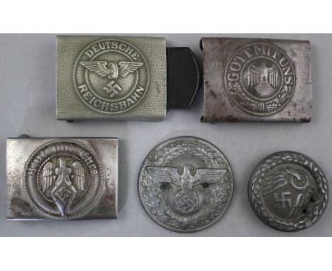 Five German Third Reich belt buckles, Five German Third Reich belt buckles, including two Reichsbahn examples, an army buckle