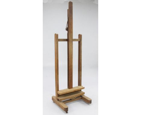 An Edwardian oak studio easel, W.24in. An Edwardian oak studio easel, W.24in.