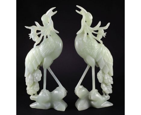 A pair of large Chinese bowenite jade figures of cranes, 20th century, 36.5cm A pair of large Chinese bowenite jade figures o