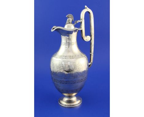 A Victorian silver urn shaped hot water jug, A Victorian silver urn shaped hot water jug, with engraved inscription and decor