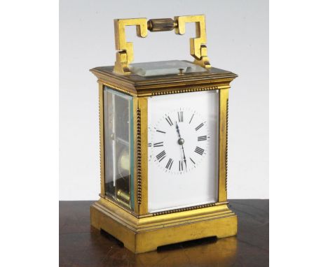 An early 20th century French gilt brass hour repeating carriage clock, 6.5in. An early 20th century French gilt brass hour re
