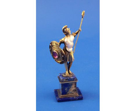 A Vienna style silver gilt, baroque pearl, diamond and cabochon set miniature figure of a warrior with trident, 5in. A Vienna