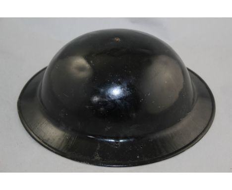 A WWII mark II Brodie helmet & another similar A WWII mark II Brodie helmet, liner marked Vero II 1940, with canvas chin stra