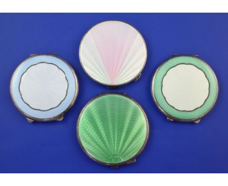 Two 1920's and two 1930's Art Deco engine turned silver and guilloche enamel circular compacts, 2.75in et infra. Two 1920's a