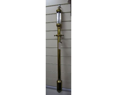 A Georgian style brass marine barometer, 3ft 1in. A Georgian style brass marine barometer, with gimbal mount and silvered sca