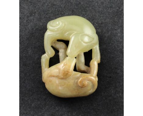 A small Chinese yellow and russet jade group of two hounds, 18th / 19th century, 3.7cm A small Chinese yellow and russet jade