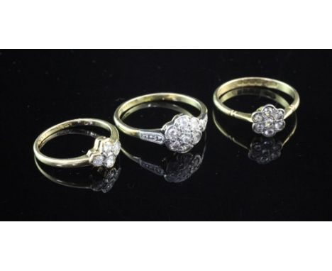Three early 20th century 18ct gold and diamond cluster rings, sizes J,Q&R. Three early 20th century 18ct gold and diamond clu