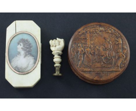 A snuff box, a box and a desk seal A 19th century French burr wood circular snuff box, the top decorated with a figural scene