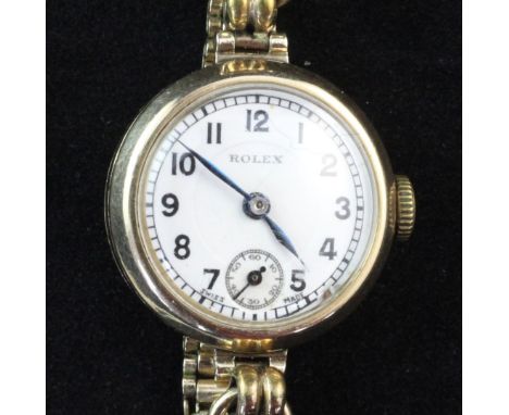 A lady's 1930's 9ct gold Rolex manual wind wrist watch, A lady's 1930's 9ct gold Rolex manual wind wrist watch, with Arabic d