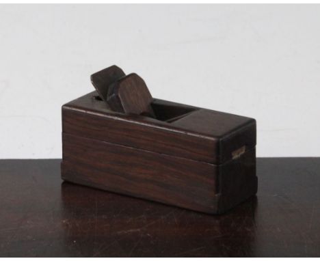 A French rosewood 'carpenters plane' snuff box, 3.5in. A French rosewood 'carpenters plane' snuff box, with swivel top, 3.5in