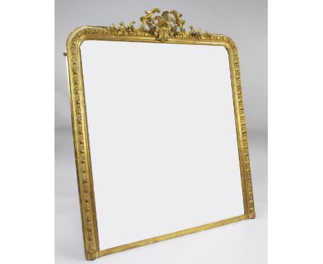 A Victorian giltwood and gesso overmantel mirror, W.4ft 6in. A Victorian giltwood and gesso overmantel mirror, with break arc