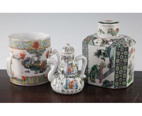 A Chinese enamelled porcelain tea caddy and cover, a wine pot and cover and a three handled tyg, 19th century, 11cm - 15cm A 