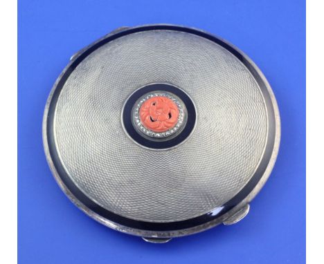 A 1930's Art Deco engine turned silver and black enamel circular compact, 3in. A 1930's Art Deco engine turned silver and bla