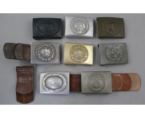 Eight German Third Reich belt buckles, Eight German Third Reich belt buckles, including two Luftwaffe buckles, a Hitler Youth