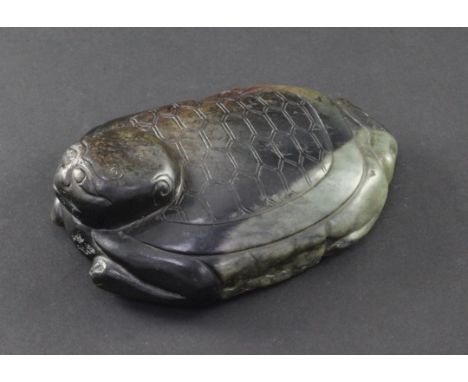 A Chinese grey and black jade figure of a recumbent turtle, 18th / 19th century, 12.5cm A Chinese grey and black jade figure 