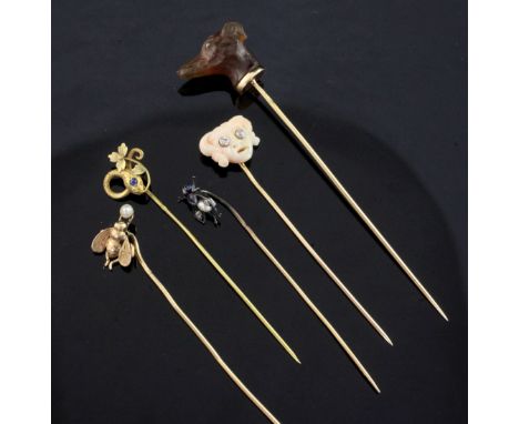 Five assorted early 20th century stick pins, largest 3.5in. Five assorted early 20th century stick pins, including a French 1