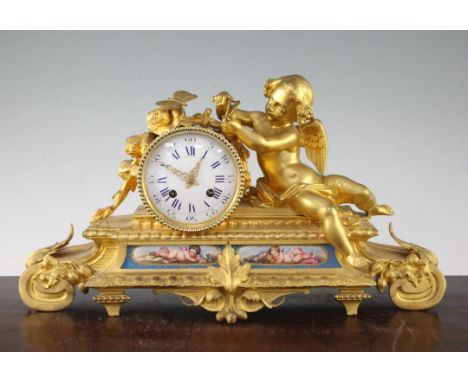 A 19th century French ormolu and Sevres style porcelain mantel clock, 17.5in. A 19th century French ormolu and Sevres style p