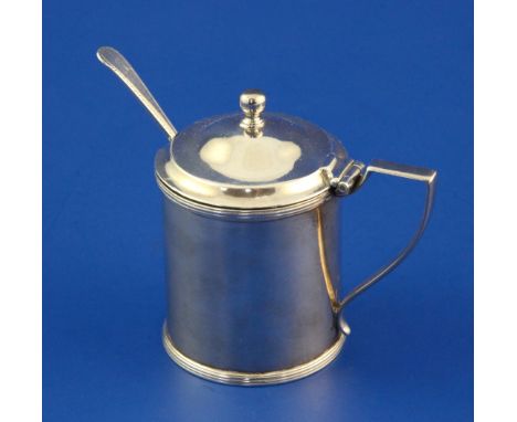 A George III silver drum mustard by John Emes, A George III silver drum mustard by John Emes, with reeded borders, blue glass