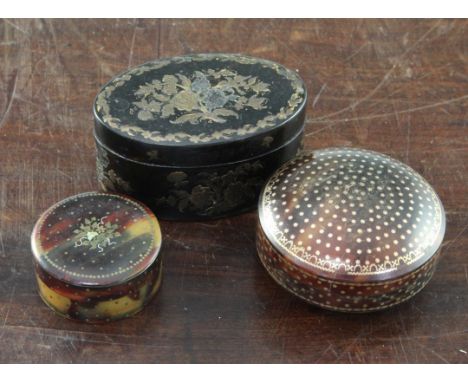 A 19th century oval tortoiseshell snuff box & 2 others A 19th century oval tortoiseshell snuff box, with floral inlaid decora