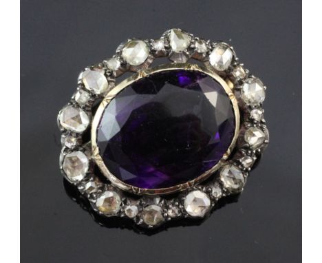 A late Victorian gold and silver amethyst and diamond brooch, 1.25in. A late Victorian gold and silver amethyst and diamond b