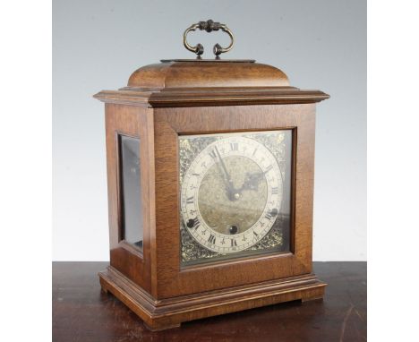 An 18th century style mahogany chiming bracket clock, 11in. An 18th century style mahogany chiming bracket clock, with square