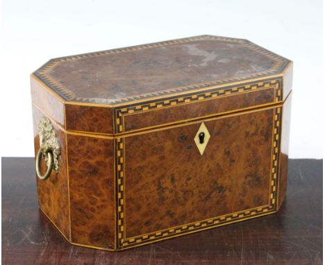 A Victorian bird's eye yew elongated octagonal tea caddy, 8.5in. A Victorian bird's eye yew elongated octagonal tea caddy, wi