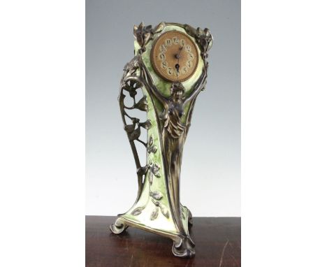 A Zsolnay? ceramic mantel timepiece, 20in. A Zsolnay? ceramic mantel timepiece, modelled with a female term and mistletoe, wi