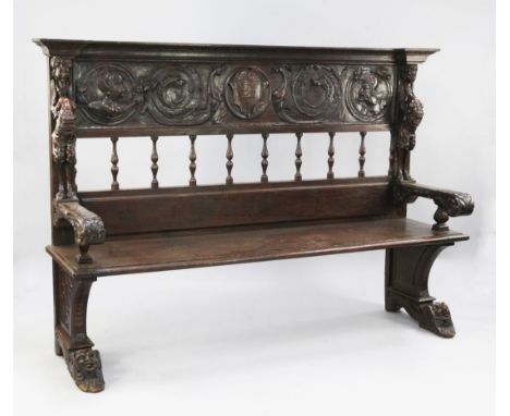 A French Renaissance revival carved oak bench seat, W.6ft 6in. A French Renaissance revival carved oak bench seat, the rectan