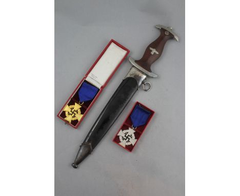 A German Third Reich SA dagger & 2 crosses A German Third Reich SA dagger, the blade etched Alles Fur Deutschland and marked 