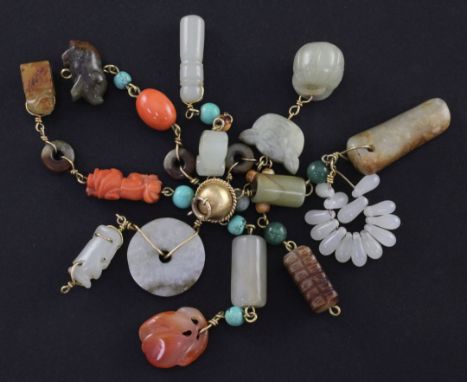 A collection of Chinese jade, hardstone and coral pendants and beads, mounted in gold, 19th / early 20th century, total lengt