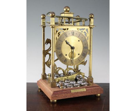 Harding and Bazeley. A lacquered brass spherical weight clock, no.4, 13.5in. Harding and Bazeley. A lacquered brass spherical