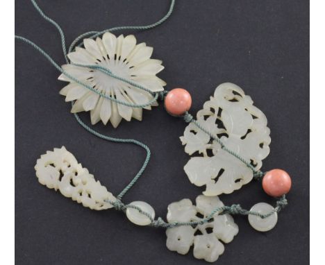 Four Chinese celadon bowenite jade flower and insect plaques, Yuan / Ming dynasty, the largest 4cm, damage to butterfly plaqu