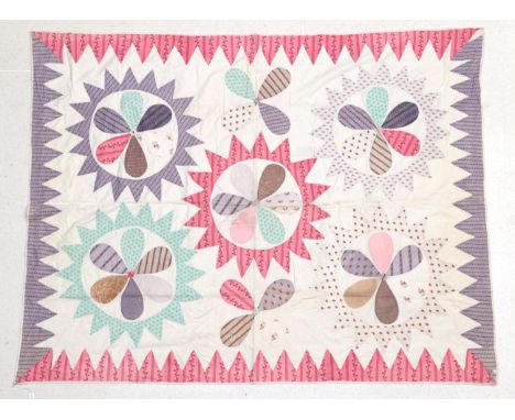 Late 19th Century White Cotton Coverlet, appliquéd overall with large flower heads, in floral sprigged printed cottons in pin