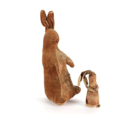 Early 20th Century Steiff Peter Rabbit, in brown velvet with glass eyes, lacking button to ear, blue coat and red slippers, 2