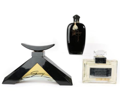 A Group of Three Large Advertising Display Dummy Factices, comprising Luciano Soprani, the rectangular glass bottle with rais
