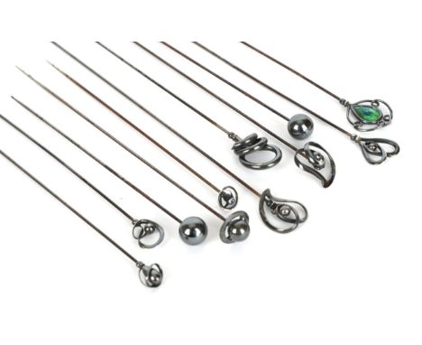 Eleven Assorted Charles Horner Decorative Silver Hat Pins, including a pair of spheres, an orb, two similar hinged examples, 