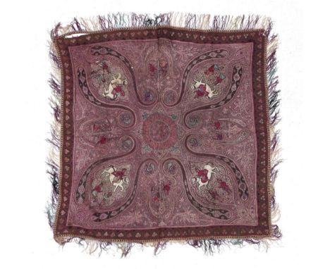 A Late 19th Century Indian/Persian Figurative Embroidered Panel, with central floret and to each corner a figure riding a whi