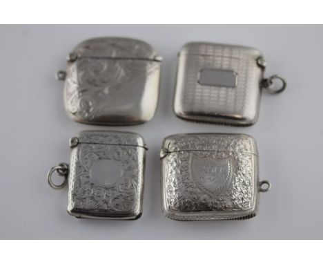 An Edwardian silver vesta case, bright cut foliate scroll decoration with blank cartouche to centre, Chester 1909, S Blancken