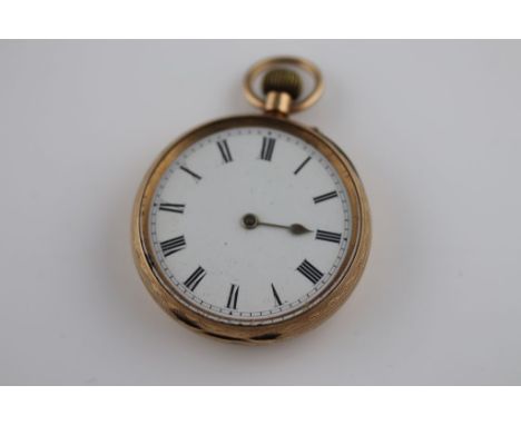 An early 20th century small 9ct gold pocket watch, white enamel dial, black Roman numerals, one hand missing, bright cut foli