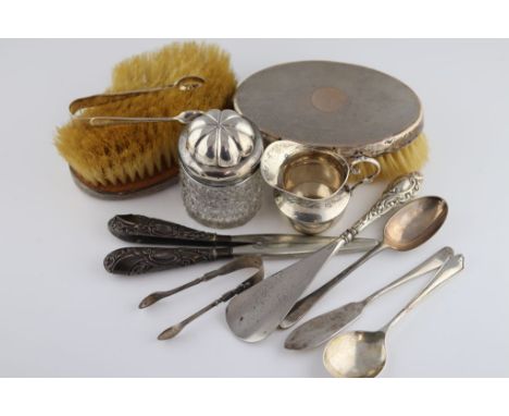 A collection of silver to include a pair of George V oval silver backed brushes, engine turned decoration and blank cartouche