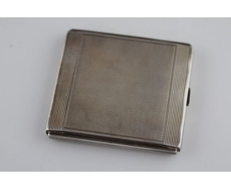 An Art Deco continental silver cigarette case, engine turned decoration with incised linear line bands, hallmarked 800, appro