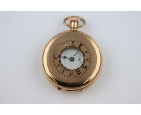A Rolex fifteen jewel 9ct yellow gold half hunter pocket watch, unsigned white enamel dial and subsidiary dial, black Roman n