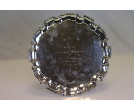 A silver salver, plain burnished ground with raised Chippendale border with central inscription "From the Officers of Signals