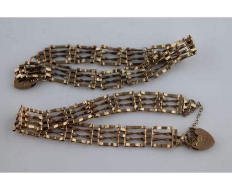 Two 9ct gold padlock clasp gate link bracelets, complete with safety chain, one af (2)