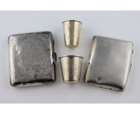 Two Russian silver graduated tot glasses,  a silver scroll engraved and initialled cigarette case, gilt interior, Birmingham 