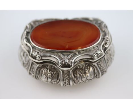 A continental 925 silver and carnelian agate Rococo style snuff box, the bombe form with embossed panels depicting traditiona